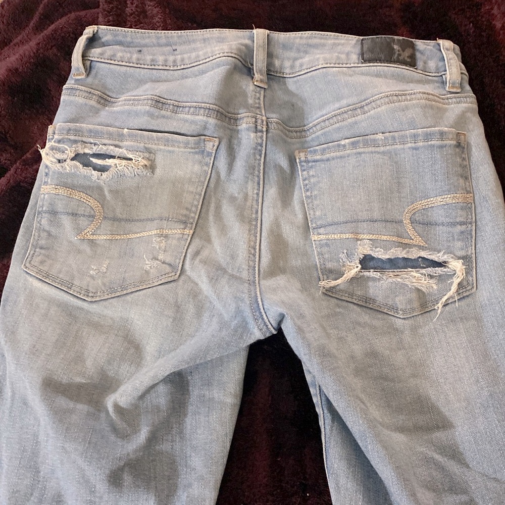 Woman distressed jeans